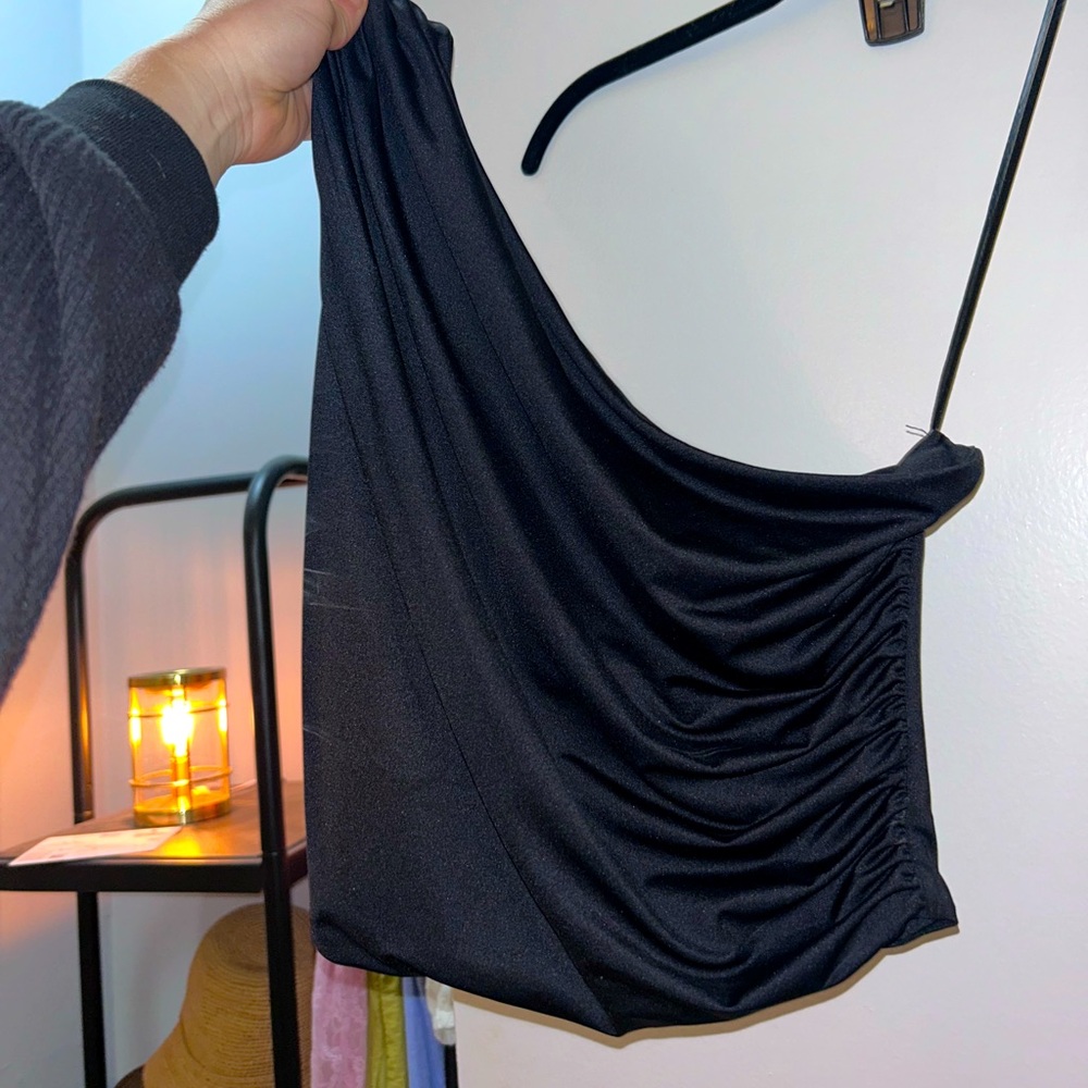 One shoulder black top